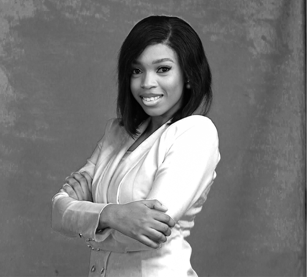 Cindy Way wearing a white suit